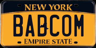 NY license plate BADCOM