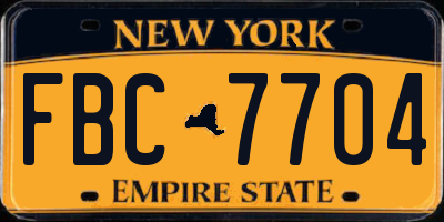NY license plate FBC7704