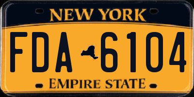 NY license plate FDA6104