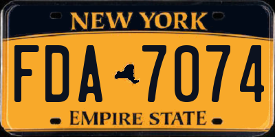 NY license plate FDA7074