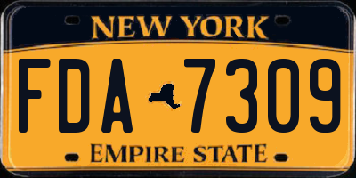 NY license plate FDA7309