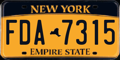 NY license plate FDA7315