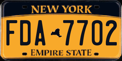 NY license plate FDA7702