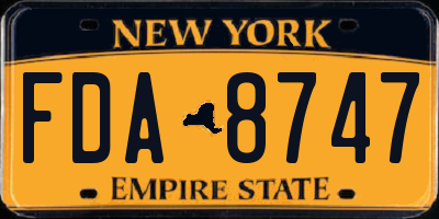 NY license plate FDA8747
