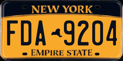 NY license plate FDA9204