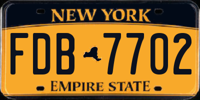 NY license plate FDB7702