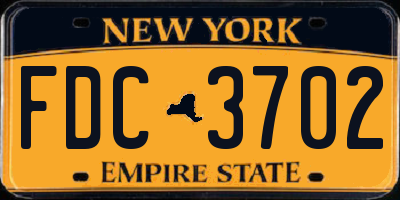 NY license plate FDC3702