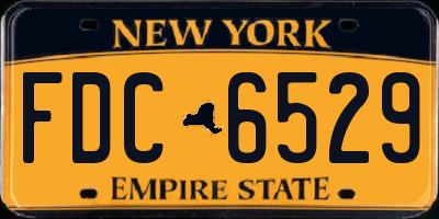NY license plate FDC6529