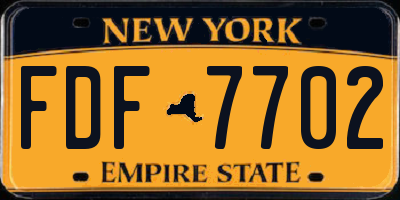 NY license plate FDF7702