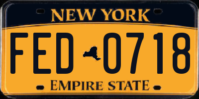 NY license plate FED0718