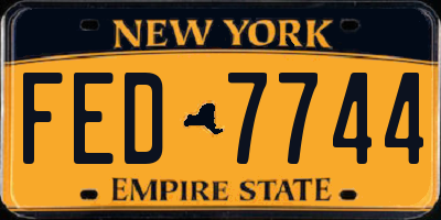 NY license plate FED7744