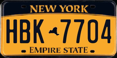 NY license plate HBK7704