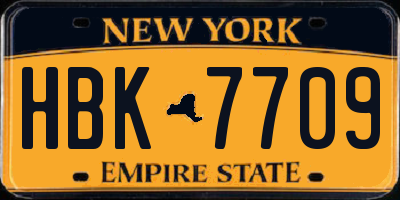NY license plate HBK7709